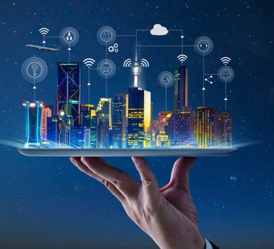 Waiter hand holding an empty digital tablet with Smart city with smart services and icons, internet of things, networks and augmented reality concept , night scene .
